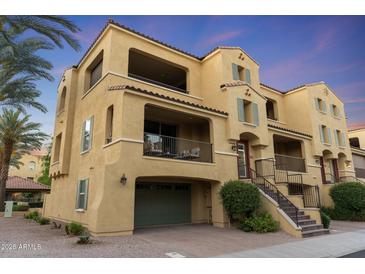 Beautiful multi-level home boasting multiple balconies, covered parking, and desert landscaping at 7122 W Ivanhoe St, Chandler, AZ 85226