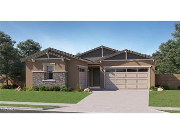 Inviting single-story home with a neutral color palette, stone accents, and a well-manicured lawn at 15041 W Gray Fox Trl, Surprise, AZ 85387