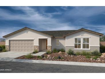 Charming single-story home featuring a stone-accented facade, well-manicured landscaping, and an inviting two-car garage at 18185 E Zuza Dr, Gold Canyon, AZ 85118