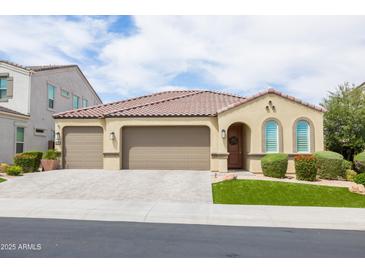 Charming single-Gathering home featuring a three-car garage, well-maintained landscaping, and tile roof at 24226 N 22Nd St, Phoenix, AZ 85024