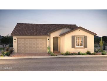 Charming single-story home with a two-car garage and desert landscaping at 16446 W Whispering Wind Dr, Surprise, AZ 85387