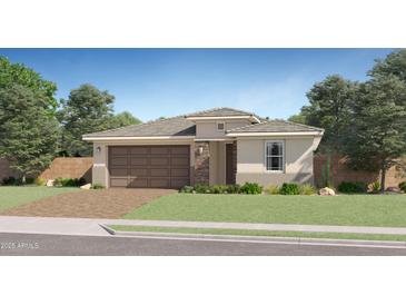 Charming single-story home with a two-car garage, stone accents, and a well-manicured front yard at 20872 S 231St Pl, Queen Creek, AZ 85142