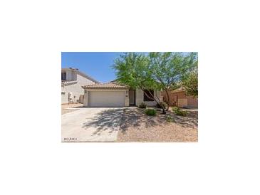 Charming single-Gathering home with a two-car garage and mature landscaping at 16813 S 30Th Ave, Phoenix, AZ 85045