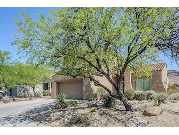Charming single-story home with desert landscaping and a two car garage at 8438 W Bajada Rd, Peoria, AZ 85383