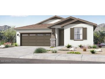 Charming single-story home featuring a two-car garage, neutral stucco exterior, and stylish brown accents at 14385 W Sand Hills Rd, Surprise, AZ 85387