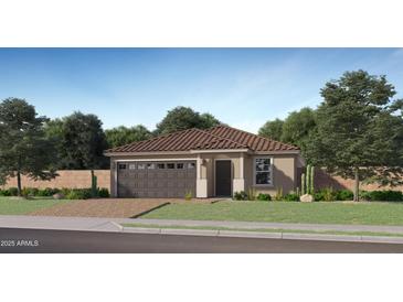 Inviting single-story home with a well-manicured lawn, tiled roof, and a convenient two-car garage at 23361 W Atlanta Ave, Buckeye, AZ 85326