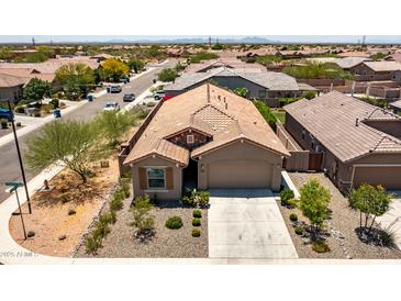 Charming single-Gathering home with tile roof, desert landscaping, and an attached two-car garage at 7648 S Thimble Peak --, Gold Canyon, AZ 85118