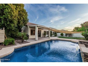 Outdoor pool with a covered patio perfect for entertaining and enjoying the beautiful backyard at 2330 E Stephens Pl, Chandler, AZ 85225