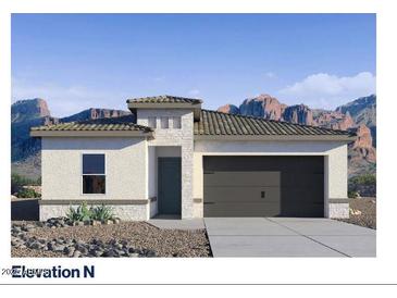 A charming single-story home with a stucco facade, stone accents, and a two-car garage at 7378 W Buckhorn Trl, Peoria, AZ 85383