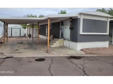Charming home exterior with covered parking and cozy front porch with a 