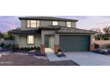 Charming two-story home featuring a modern design, neutral color palette and well-manicured landscaping at 2948 E Mecklenburg Way, San Tan Valley, AZ 85143