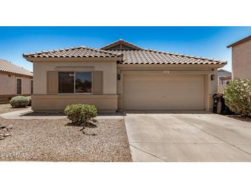 Charming single-story home featuring a tile roof and a two-car garage at 11531 E Persimmon Ave, Mesa, AZ 85212