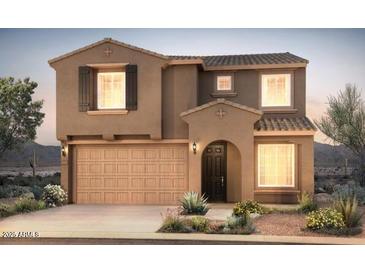 Charming two-story home with a two-car garage, desert landscaping, and a welcoming entrance at 13557 W Cassia Trl, Peoria, AZ 85383