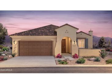 Inviting single-story home with a two-car garage, tile roof, manicured landscaping, and covered front entry at 6298 W Honors Way, Florence, AZ 85132