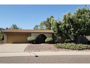 Charming single-story home featuring a well-maintained front yard and attached garage at 3924 E Cortez St, Phoenix, AZ 85028