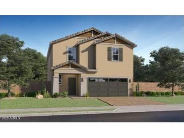 Charming two-story home featuring a symmetrical design, desert landscaping and a two-car garage at 9526 W Catalina Dr, Phoenix, AZ 85037