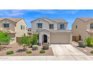 Charming two-story home with landscaped yard and attached two-car garage, perfect for a Gathering at 32347 N Vernal Ln, San Tan Valley, AZ 85144