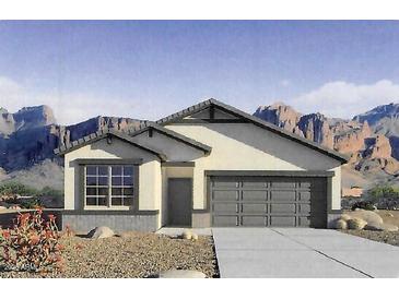 Charming single-story home featuring desert landscaping and a two-car garage at 10618 W Bloch Rd, Tolleson, AZ 85353