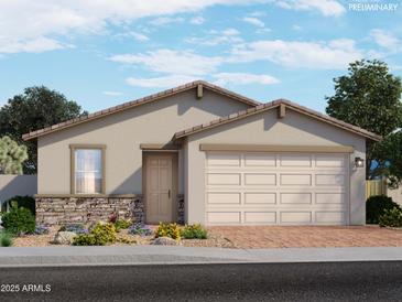 Charming single-story home featuring a two-car garage and a beautifully landscaped front yard at 4225 W Lisa Ln, San Tan Valley, AZ 85144