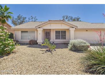 Charming single-story home with well-maintained desert landscaping and neutral color palette at 13431 N 30Th St, Phoenix, AZ 85032