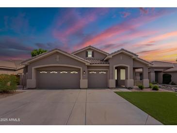 Charming single-story home featuring a three-car garage and well-maintained landscaping at 1635 E Harrison St, Chandler, AZ 85225