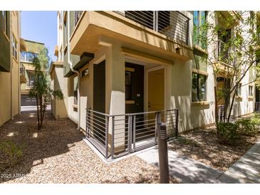 Charming townhouse featuring a private entrance and modern architectural details at 4236 N 27Th St # 37, Phoenix, AZ 85016