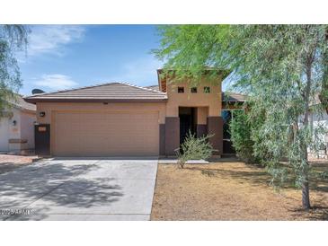 Charming single-story home featuring a tile roof and a two-car garage at 471 W Gascon Rd, San Tan Valley, AZ 85143