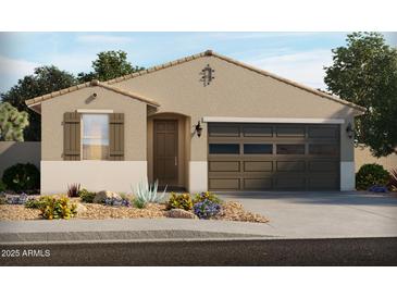 Charming single-story home featuring a well-manicured desert landscape and a two-car garage at 19422 N Fiano Dr, Maricopa, AZ 85138