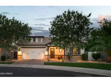 Charming single-Gathering home with manicured lawn, brick accents, and a well-lit, two-car garage at 1529 W State Ave, Phoenix, AZ 85021