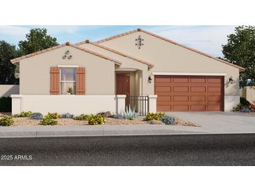 Charming single-story home with a well-maintained front yard and attached two-car garage at 17643 W Mariposa Dr, Goodyear, AZ 85395