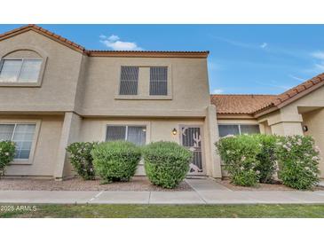 Charming two-story home with desert landscaping, offering a welcoming curb appeal at 5808 E Brown Rd # 49, Mesa, AZ 85205