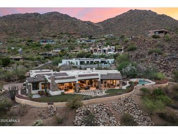 Expansive estate with stunning desert views, modern design, and resort-style pool nestled in the foothills at 6102 E Sage Dr, Paradise Valley, AZ 85253