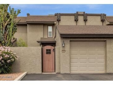 Charming townhome with a one car garage, private courtyard, and desert landscaping at 2338 W Lindner Ave # 52, Mesa, AZ 85202