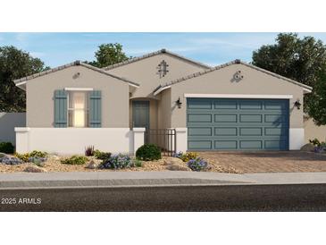 Charming single-story home featuring a two-car garage, inviting entryway, and low-maintenance landscaping at 17798 W Pierson St, Goodyear, AZ 85395
