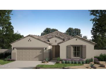 Charming single-story home featuring a tile roof, neutral stucco, and a well-manicured front yard with desert landscaping at 23189 W Winslow Ave, Buckeye, AZ 85326