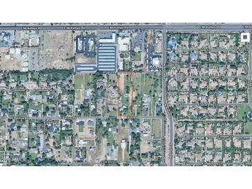 Aerial view of the lot location, surrounded by neighborhood, trees, and streets at 3102 E Backus Rd, Mesa, AZ 85213