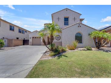 Charming two-story home with a well-maintained lawn and decorative palm trees at 6840 S Crystal Way, Chandler, AZ 85249