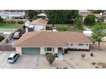 Charming single-Gathering home featuring a well-maintained yard and attached garage, great for a Gathering at 1160 W Ivanhoe St, Chandler, AZ 85224