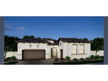 Charming single-story home with white stucco and detailed stonework, beautifully landscaped for curb appeal at 1111 E Peach Tree Dr, Chandler, AZ 85249