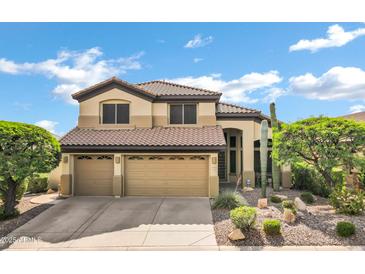 Charming two-story home with a three car garage, desert landscaping, and a tile roof at 2758 N Sterling --, Mesa, AZ 85207