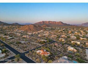 Stunning aerial view of the community, showcasing the desert landscape and mountain views at 8540 E Mcdowell Rd # 119, Mesa, AZ 85207