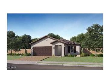 Charming single-story home with a well-maintained lawn and desert landscaping, featuring a two-car garage at 23362 W Atlanta Ave, Buckeye, AZ 85326