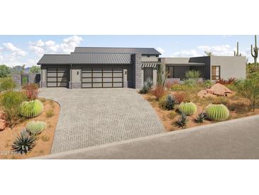 Modern home featuring a metal roof, desert landscaping, and a three-car garage at 3911 W Oraibi Dr # 6, Glendale, AZ 85308