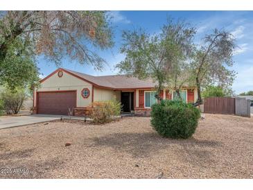 Charming single-story home with a well-maintained yard and inviting curb appeal at 4606 W Park Ave, Chandler, AZ 85226