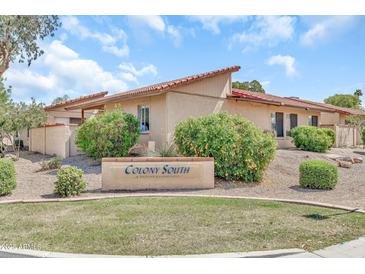 Charming Colony South townhome with mature landscaping and community sign at 14801 N 25Th Dr # 2, Phoenix, AZ 85023