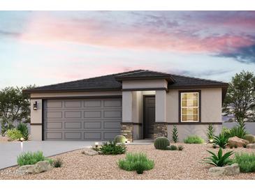 Charming single-story home with a two-car garage and desert landscaping at 19320 N Diego Way, Maricopa, AZ 85138