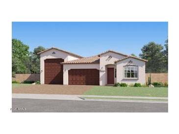 Charming single-story home with a three-car garage and well-maintained landscaping at 26391 N 79Th Dr, Peoria, AZ 85383