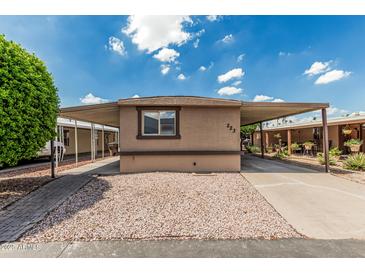 Charming single-story home with covered parking, desert landscaping, and inviting curb appeal at 6812 N Polk St # 223, Phoenix, AZ 85043