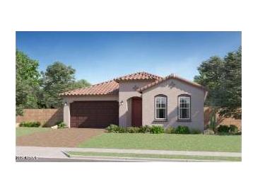 Charming one-story home featuring a tile roof, two-car garage, and a well-manicured lawn at 7842 W Tether Trl, Peoria, AZ 85383