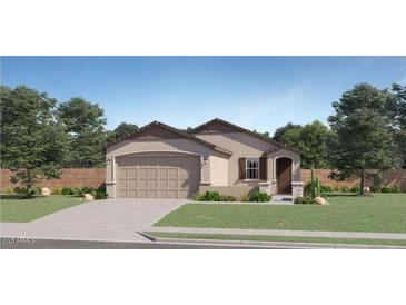 Charming single-story home featuring a two-car garage, landscaped yard, and inviting front entrance at 15018 W Buckskin Trl, Surprise, AZ 85387
